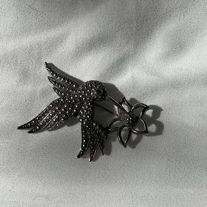 Hummingbird/flower brooch